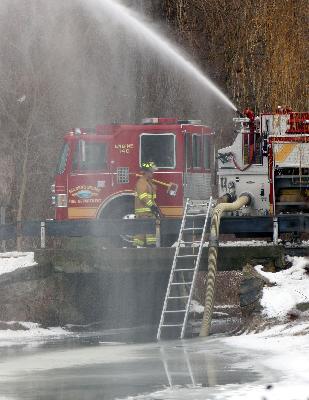 E-140 at a draft site for Croton Falls FD working fire. 12/25/09 picture by Frank Becerra Jr. / The Journal News Frank Becerra Jr. / The Journal News